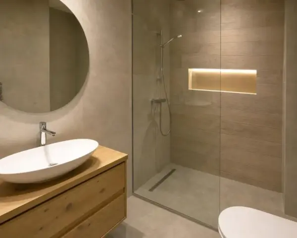 Ciepła, subtelna barwa światła w łazience podkreśla drewniane akcenty i tworzy relaksującą atmosferę.
